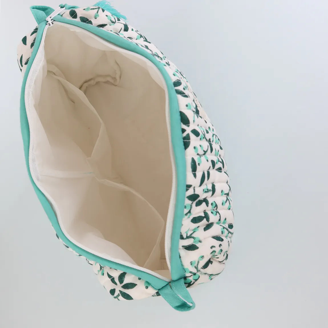 Trousse de toilette blanche et bleu motif feuilles