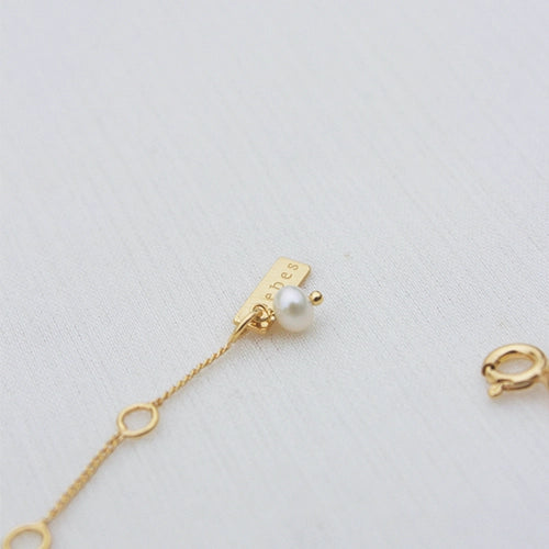 Bracelet doré avec pierre en nacre rose poudrée - La rosée