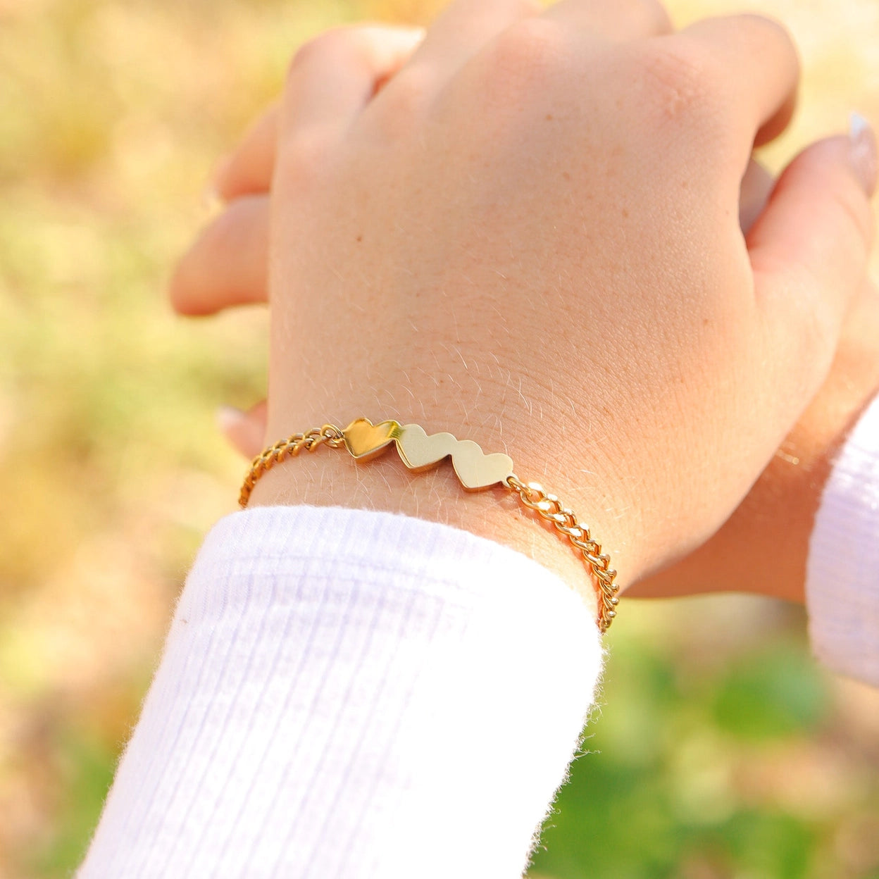 Bracelet 3 coeurs en acier PVD doré 18K